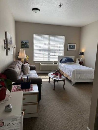 Well-furnished private resident room with natural light
