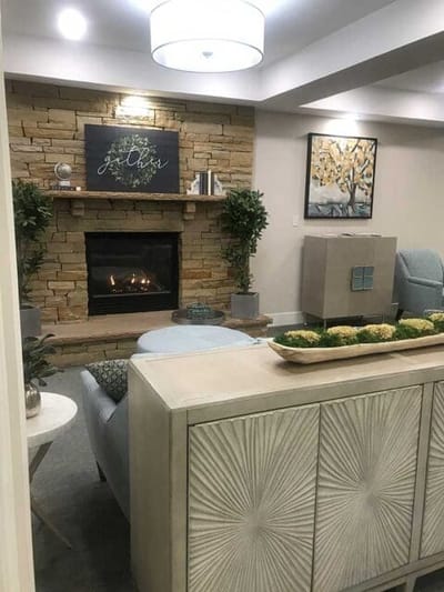 Cozy common area with a fireplace and seating
