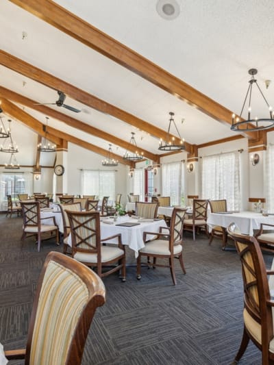 Dining area with elegant seating and decor