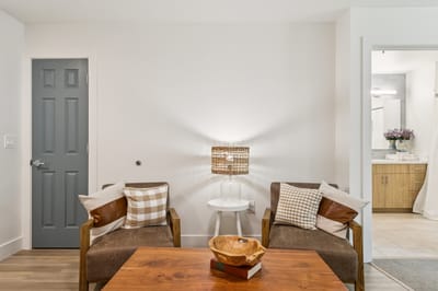 Cozy sitting area in a resident room with a small table