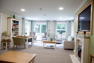 Bright common area with seating and natural light