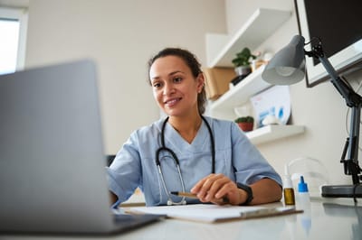 Healthcare professional engaging with a patient online