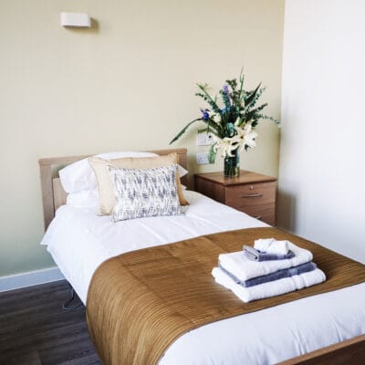 Cozy single bedroom with floral decor