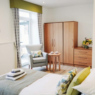 Interior view of a cozy resident room with furniture