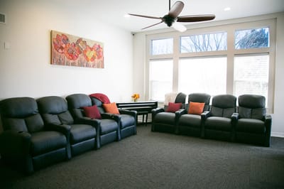 Comfortable seating area in a bright common room
