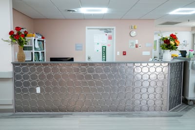 Front desk area with floral decorations