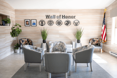 Interior common area with comfortable seating and decorative wall