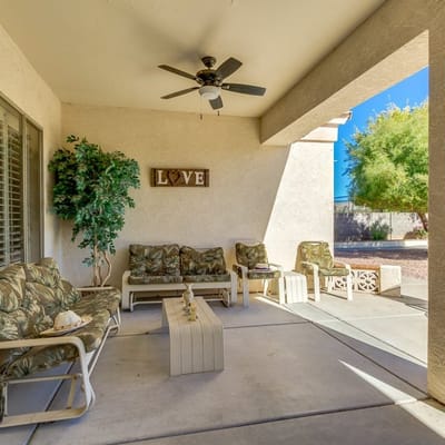 Outdoor seating area with a table and decorations