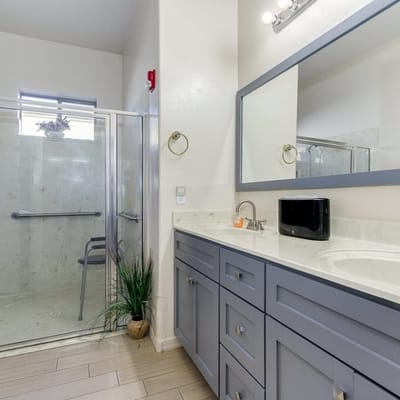 Modern bathroom with walk-in shower and accessible features