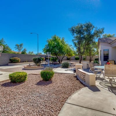 Well-maintained outdoor space with seating and landscaping