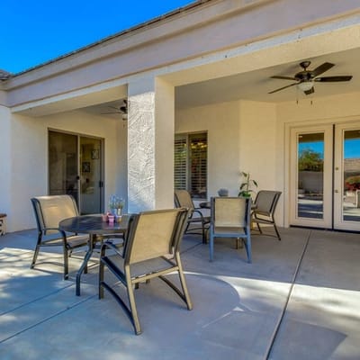 Inviting outdoor seating area with tables and chairs