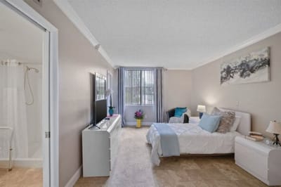 A cozy private resident room with modern decor