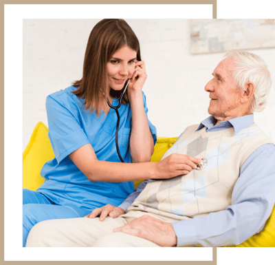 Healthcare provider assisting a senior resident indoors