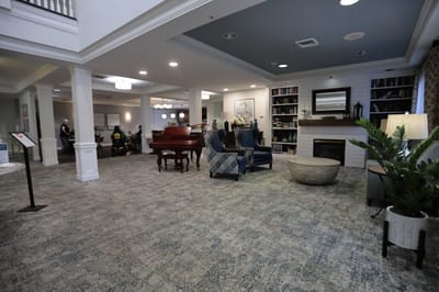 Common area with seating and a piano