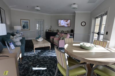 Common area with seating and television in a lounge