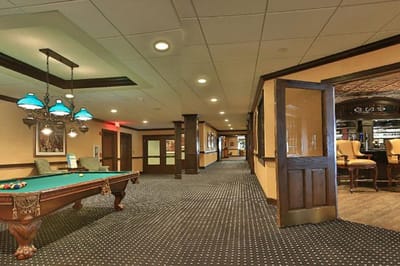 Interior view of a common area with a pool table