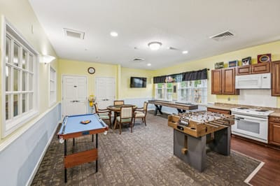 Bright interior of a common area with game tables