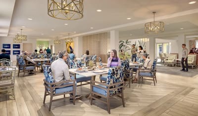 Residents dining in a bright, modern dining area