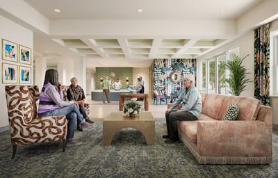 Residents and staff interacting in a vibrant common area