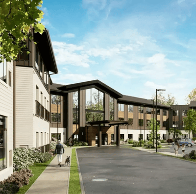 Exterior view of a senior living facility with residents