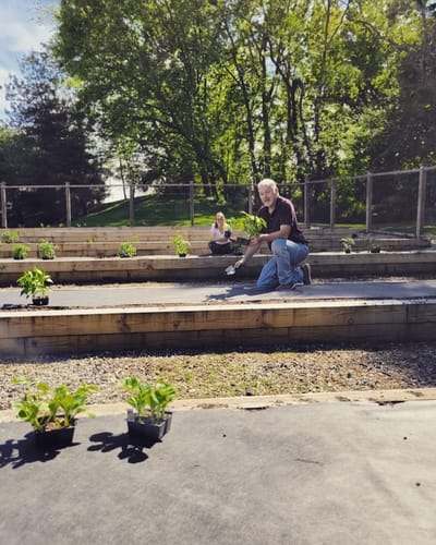Residents gardening in an outdoor space