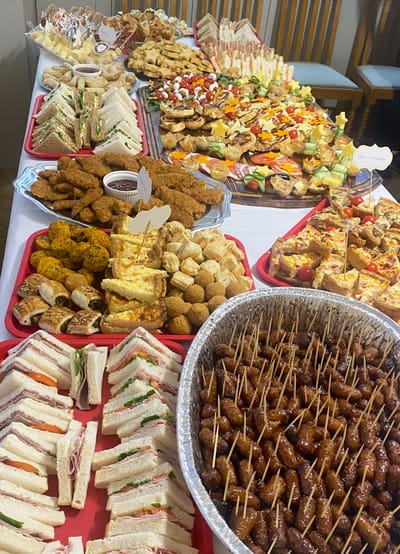 A variety of food platters laid out for an event