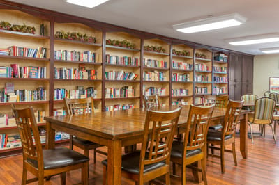 Interior common area with bookshelves and tables
