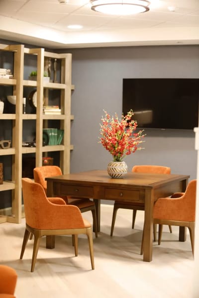 Interior common area with a table and chairs