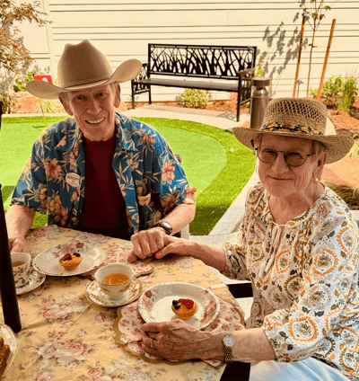 Residents enjoying dessert outside in the garden