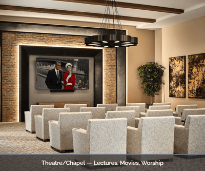 A modern theater/church space with seating and presentation screen