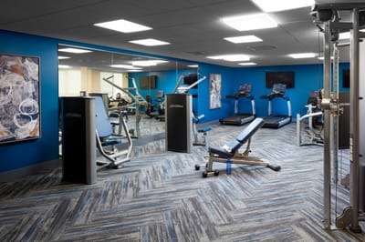 Interior view of a fitness area with exercise equipment