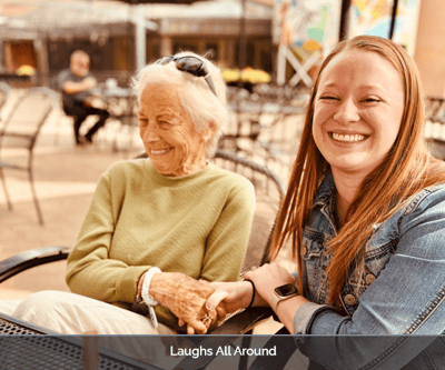 Residents enjoying time outdoors, sharing laughter