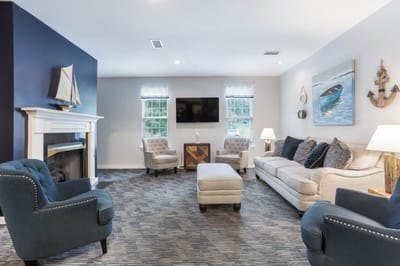 Bright common area with comfortable seating and decor