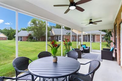 Outdoor patio with seating and decorative plants