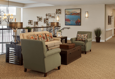 Cozy common area with seating and artwork