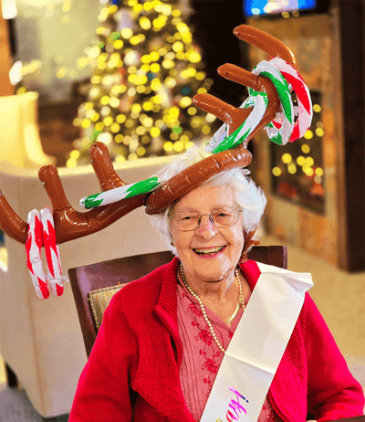 Resident celebrating with festive reindeer headband