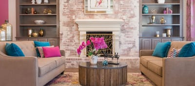 Cozy common area with seating and floral decor