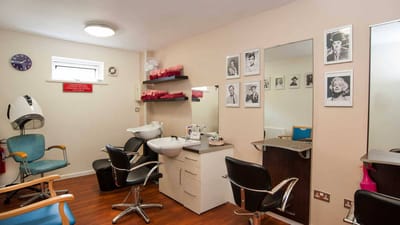Interior view of a hair salon in the facility