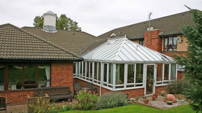 Conservatory area with seating and green space