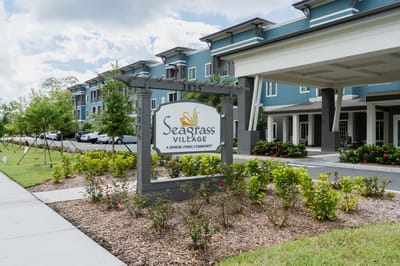 Sign for Seagrass Village outside the facility