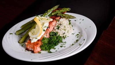 Plate of salmon with asparagus and rice