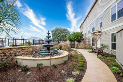 Beautiful garden area with a fountain and pathway