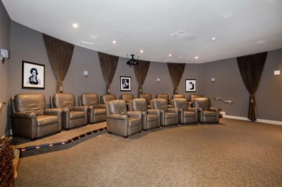 Cozy private theater seating area in the facility