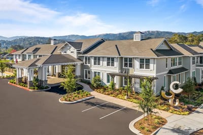 Exterior view of Oakmont of Novato with landscaped entrance