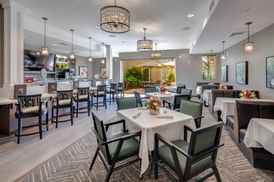 Bright dining room with elegant decor and outdoor view
