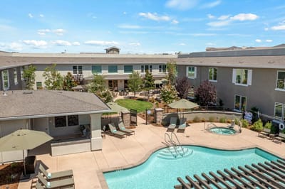 Aerial view of the facility's outdoor pool and seating area
