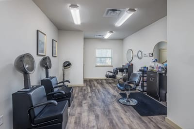 Interior of a hair salon with styling chairs