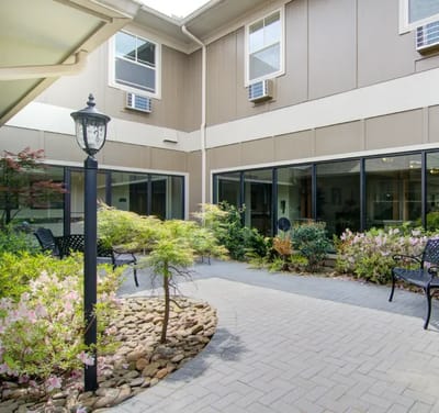 Serene outdoor courtyard with seating and plants