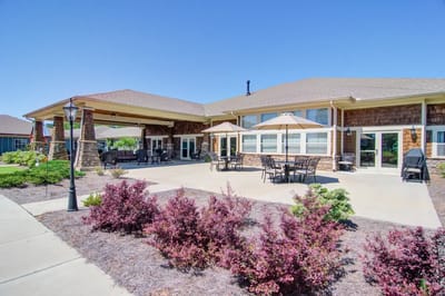 Outdoor seating area with patio and landscaping