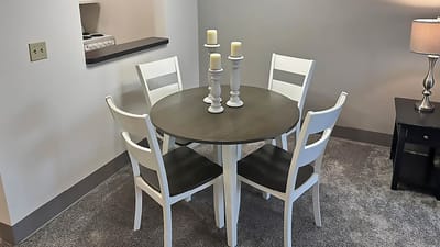 Cozy dining area with a round table and candles